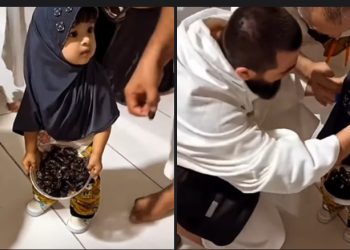 Malena djevojčica služi hurme za iftar u haremu Kabe VIDEO